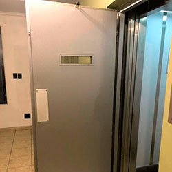 Envelopamento para porta de elevador com Aço Escovado - Vila Mariana - São Paulo