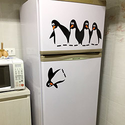 Envelopamento de Geladeira com Pinguins